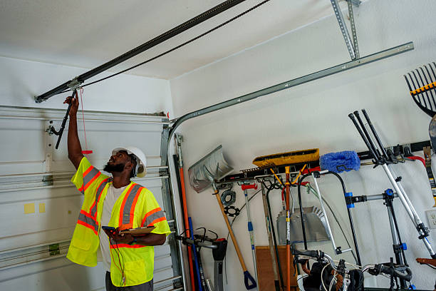 Professional Garage Door Maintenance technician working in East Aurora, NY